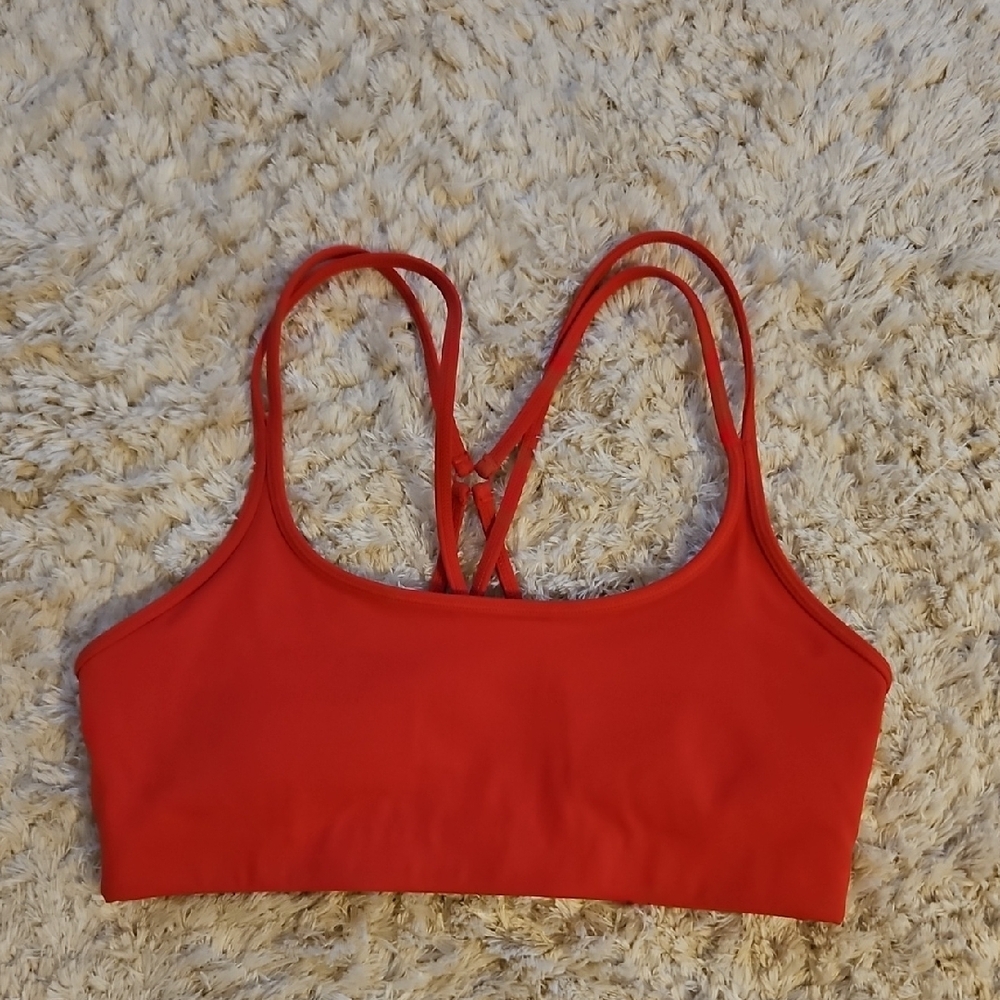 Bandier Vibrant Red Sports Bra with Adjustable Straps and Scoop Neckline